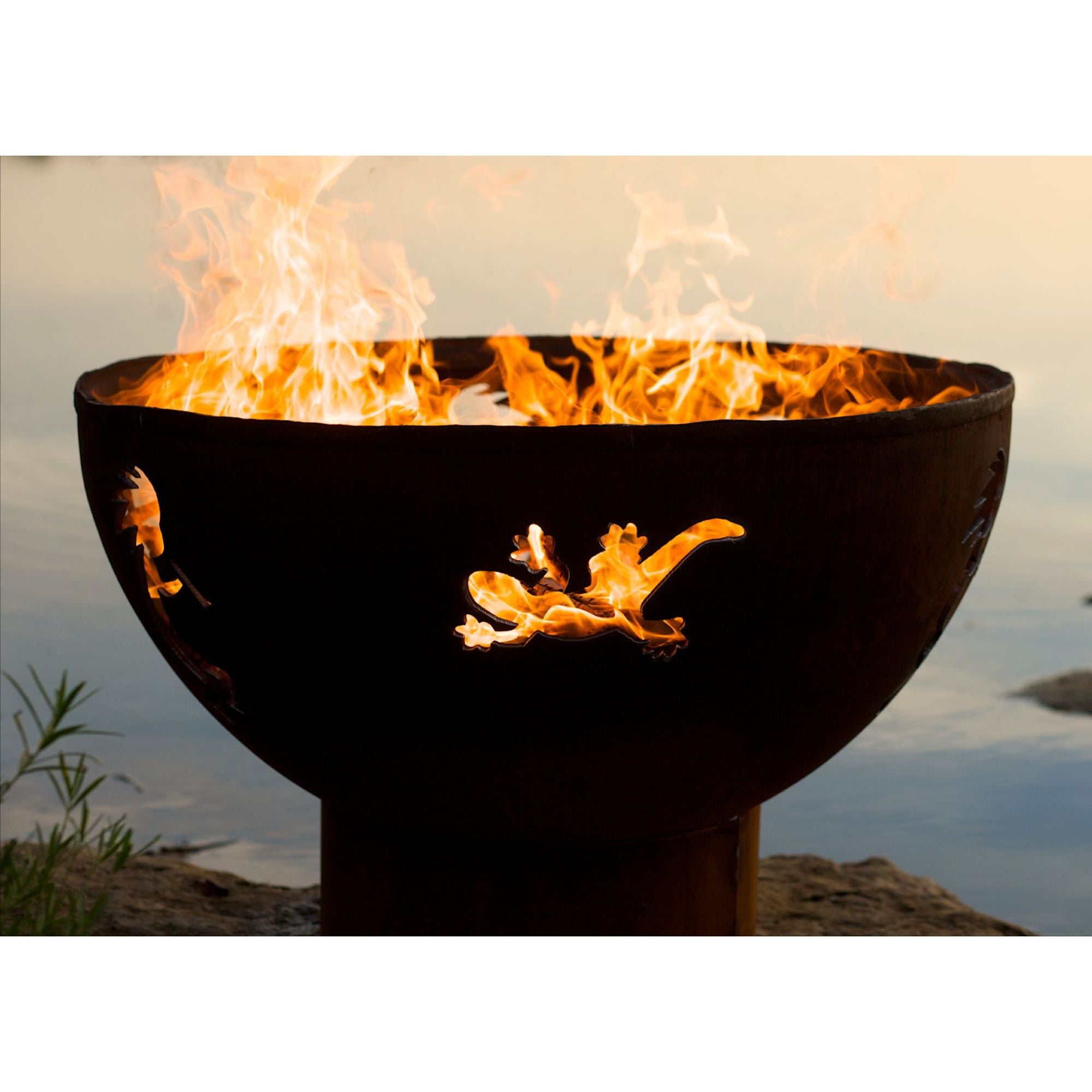 Fire pit with flames burning against a natural background