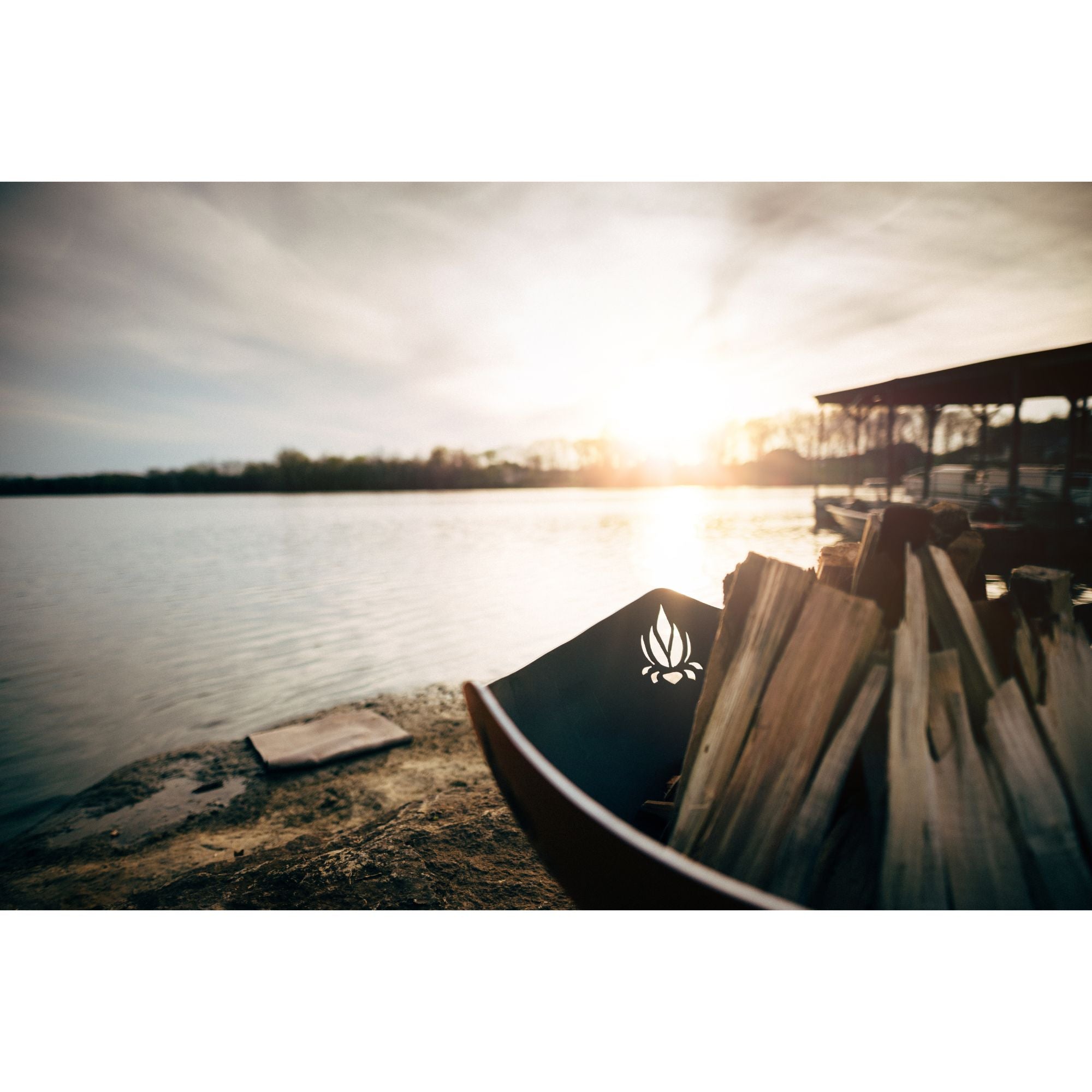 Fire Pit on a dock at sunset with a blurred background