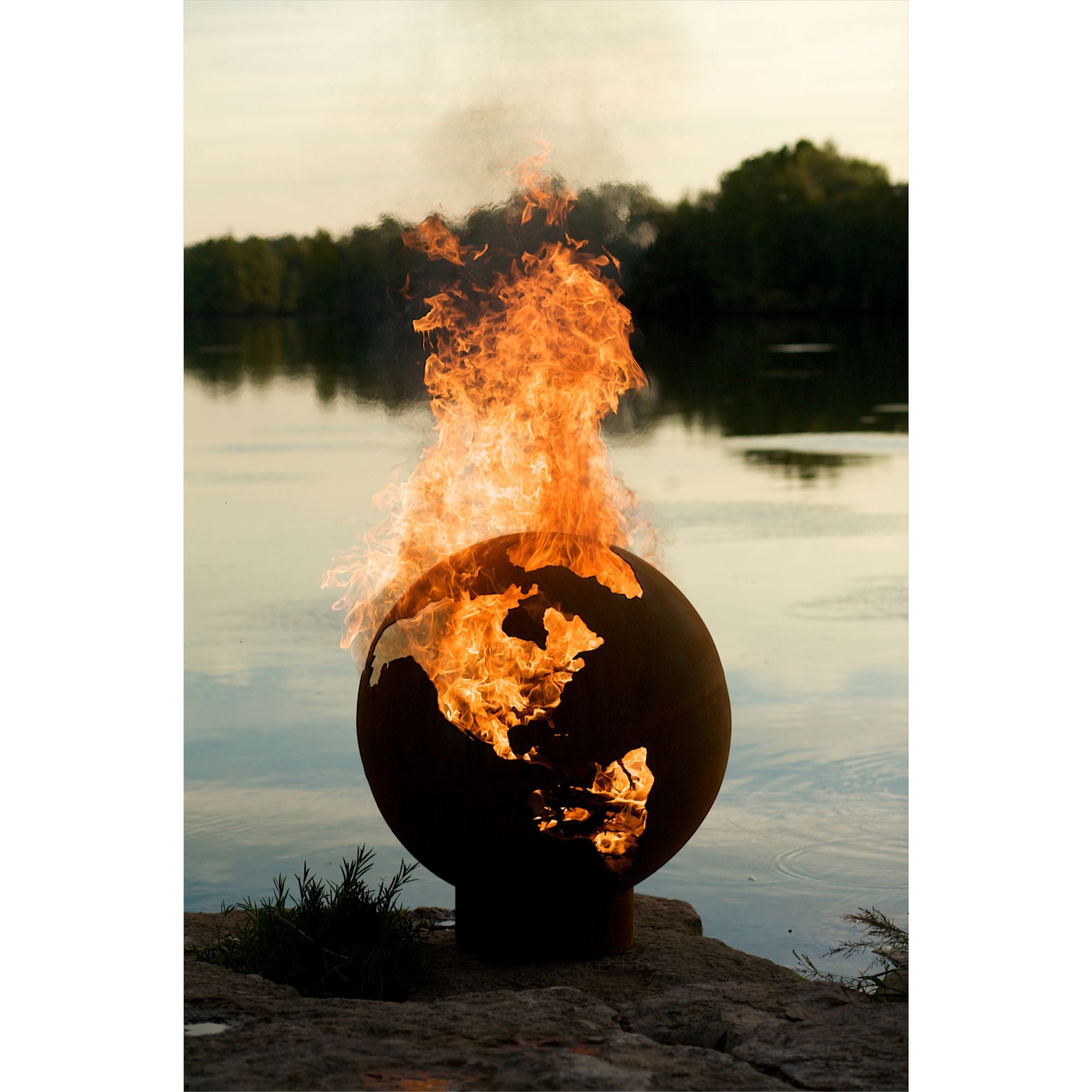 Fire pit with flames at night time