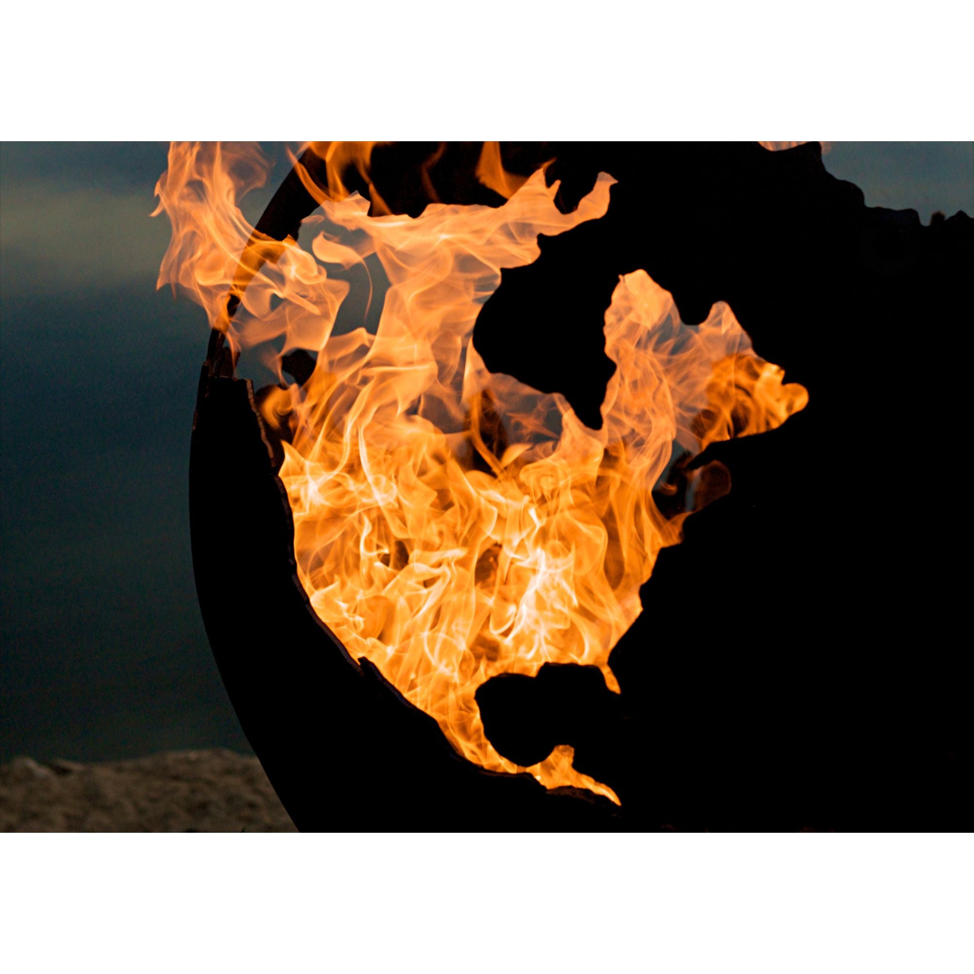 close up of a fire pit with flames