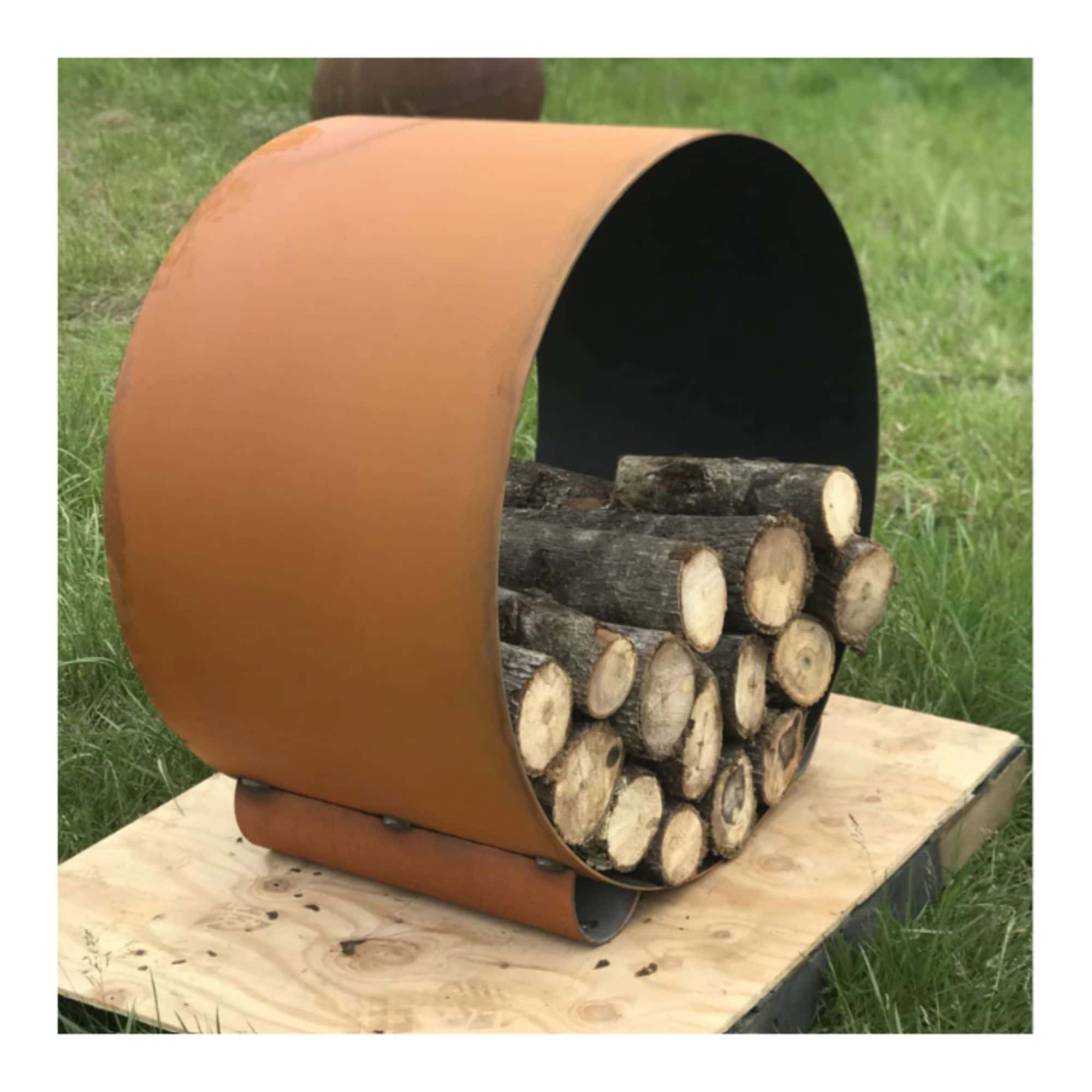 Orange outdoor round log rack with wood on a wooden surface