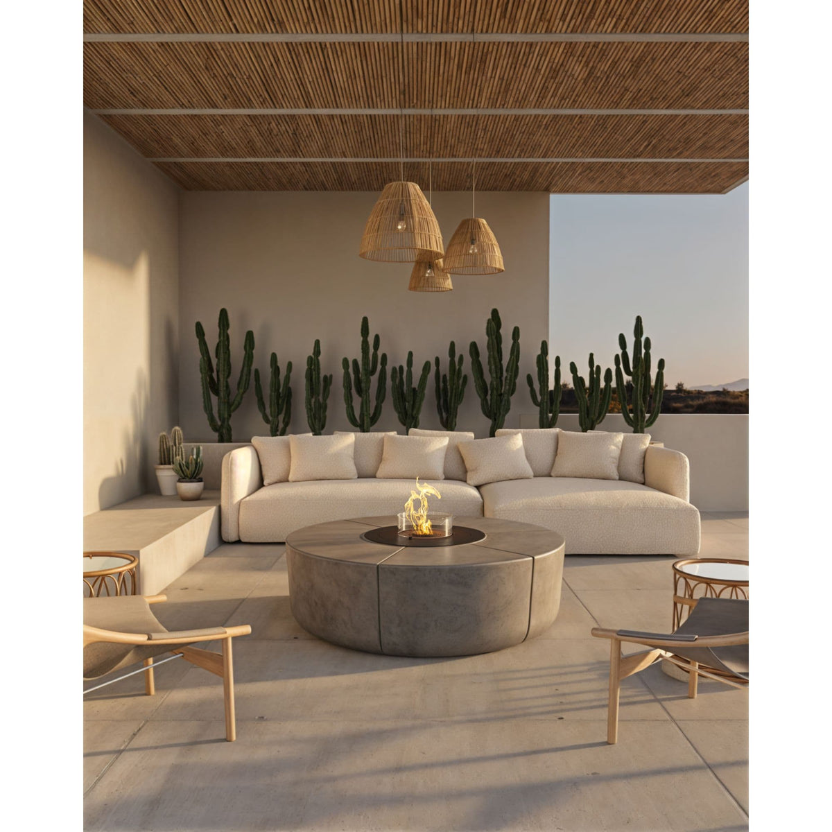 Outdoor patio with fire pit, chairs and a couch