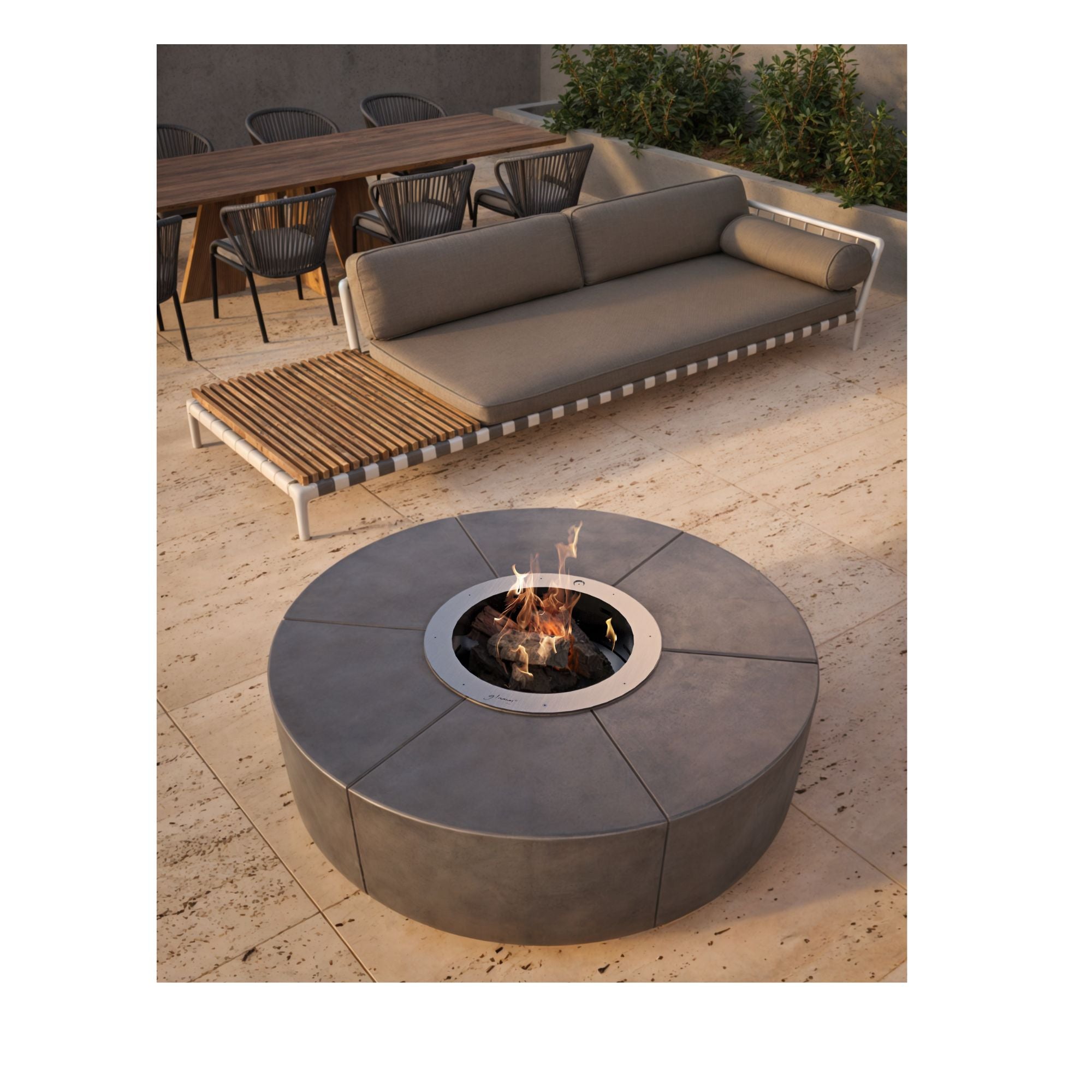Outdoor patio setting with a fire pit table, sofa, and chairs.
