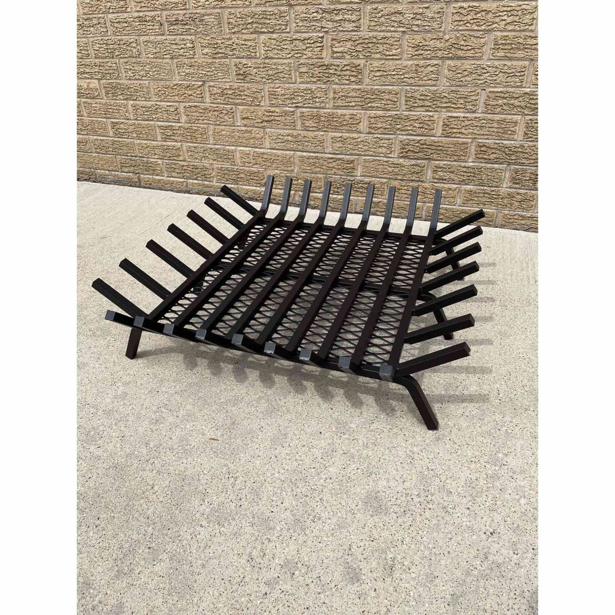 Master Flame square fire pit grate with Char-Guard ember catch, angle view