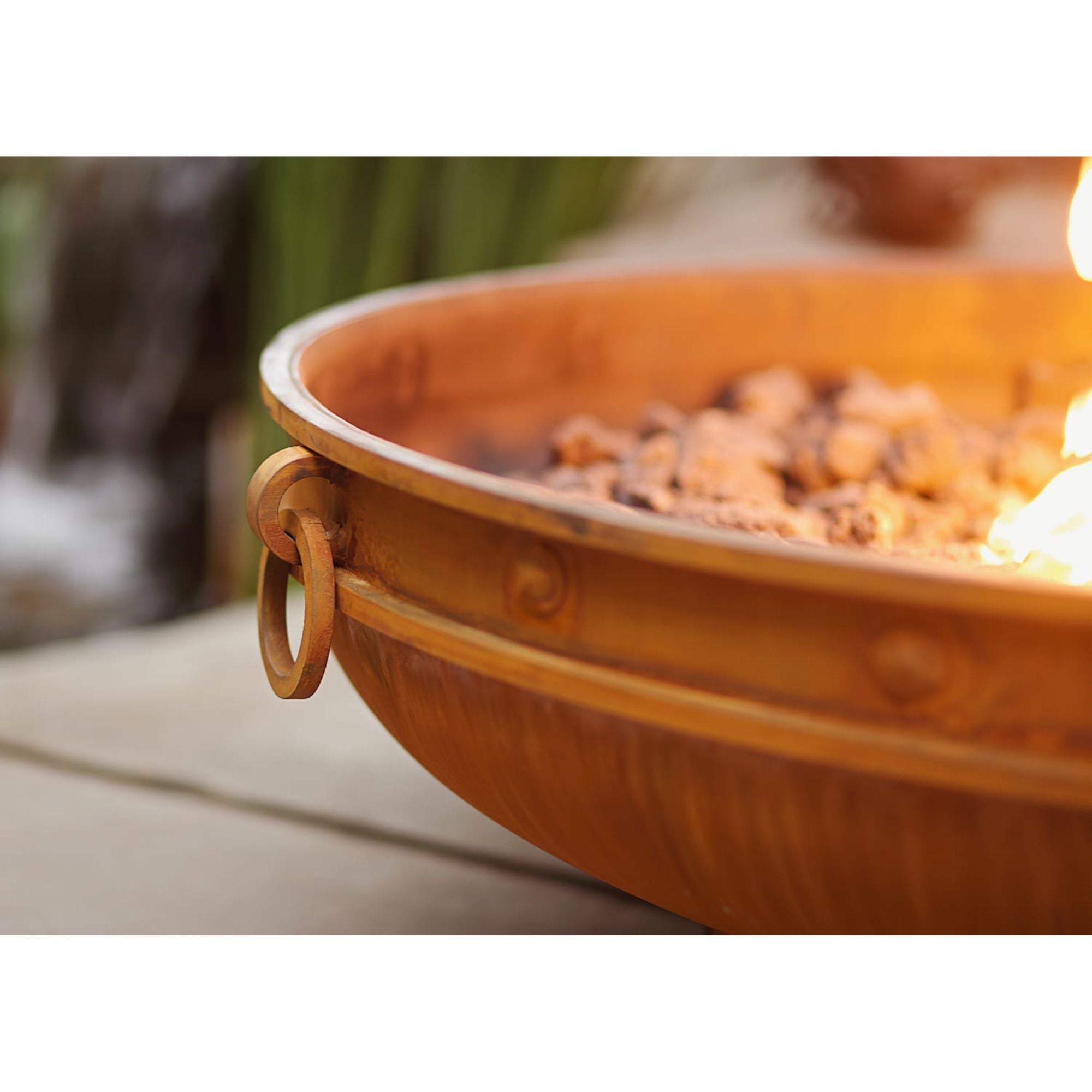 Wooden bowl with handles on a blurred background