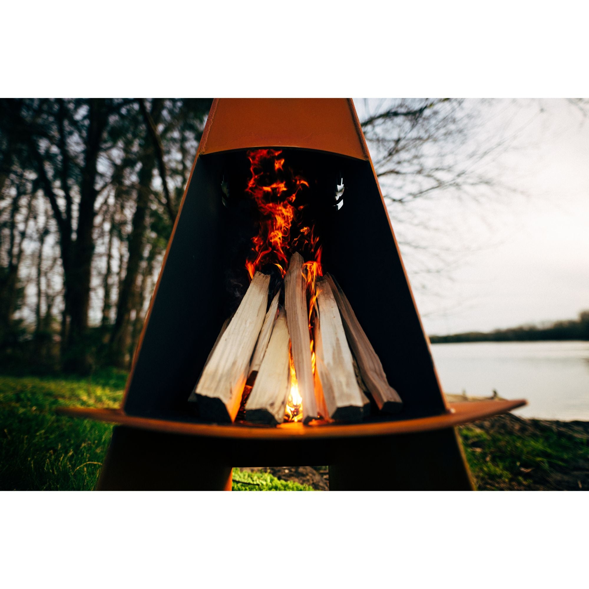 Fire pit with wooden design in a natural setting