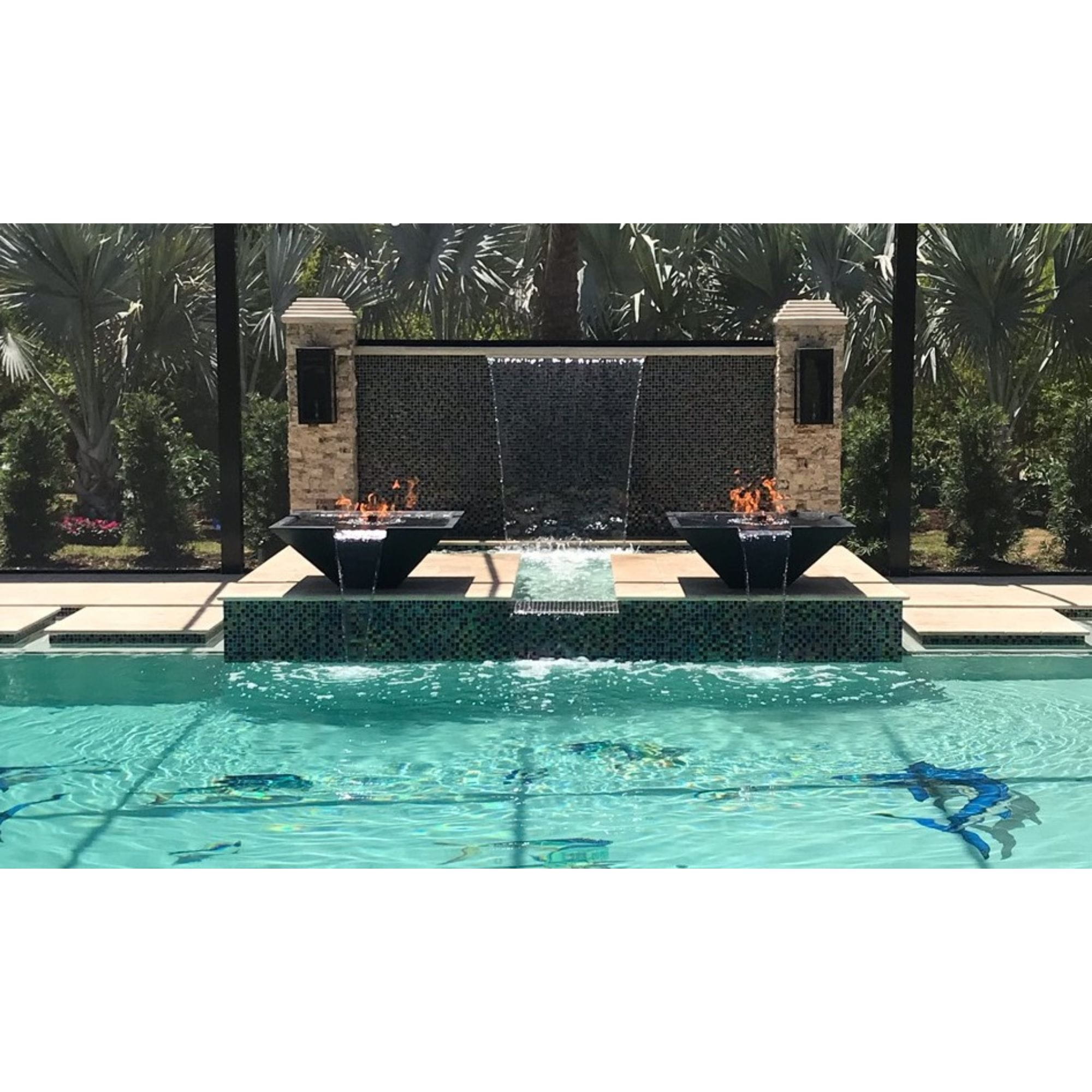 fire bowl with flames by a pool