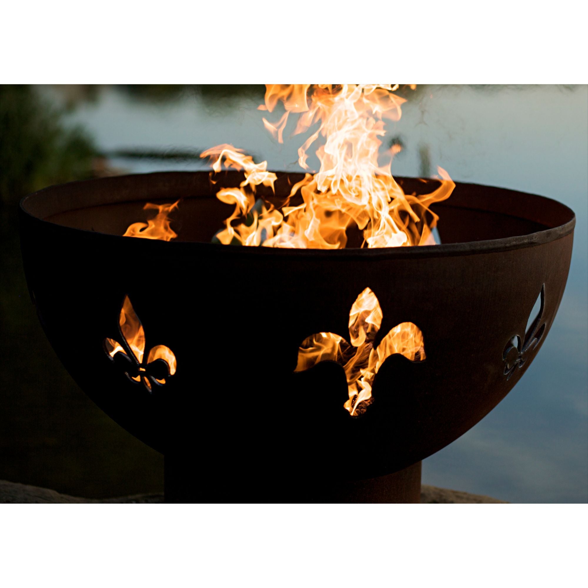 Fire pit with flames and decorative elements against a natural background