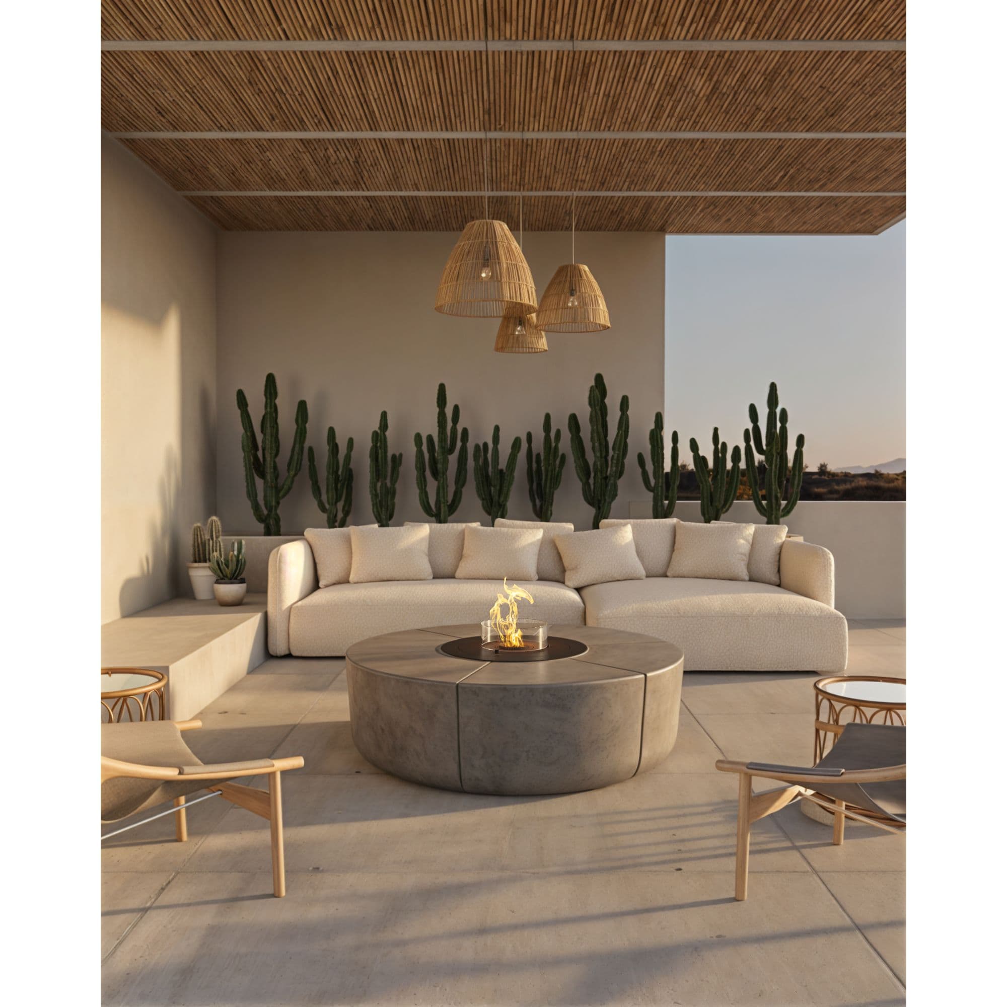 Outdoor patio with fire pit, chairs and a couch 