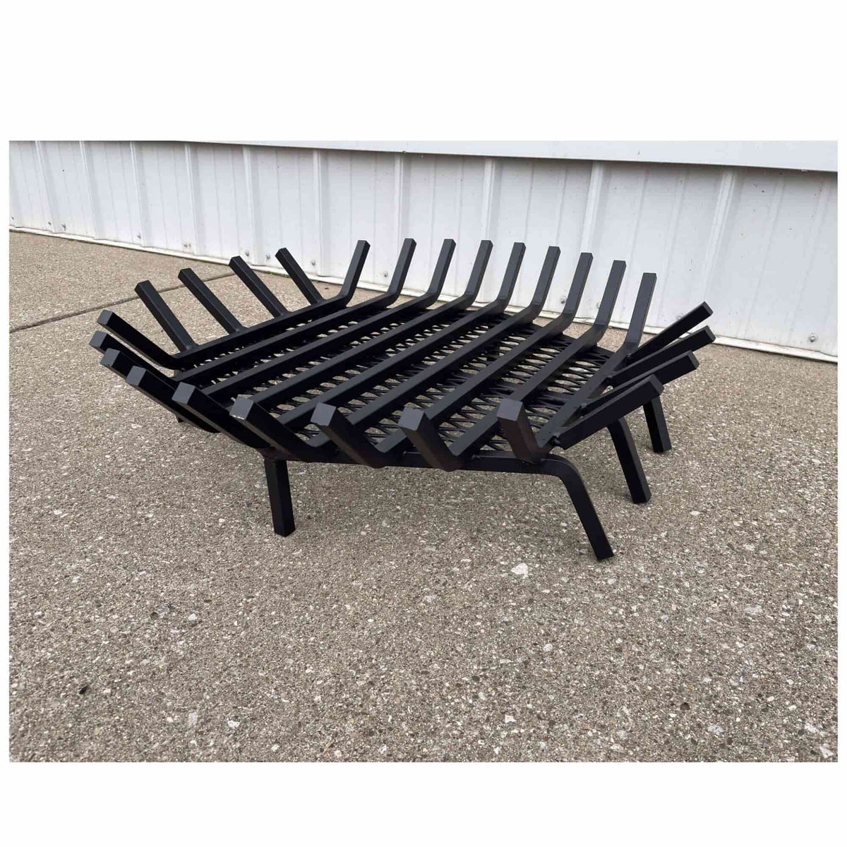 Master Flame round fire pit grate with Char-Guard ember catch, side view