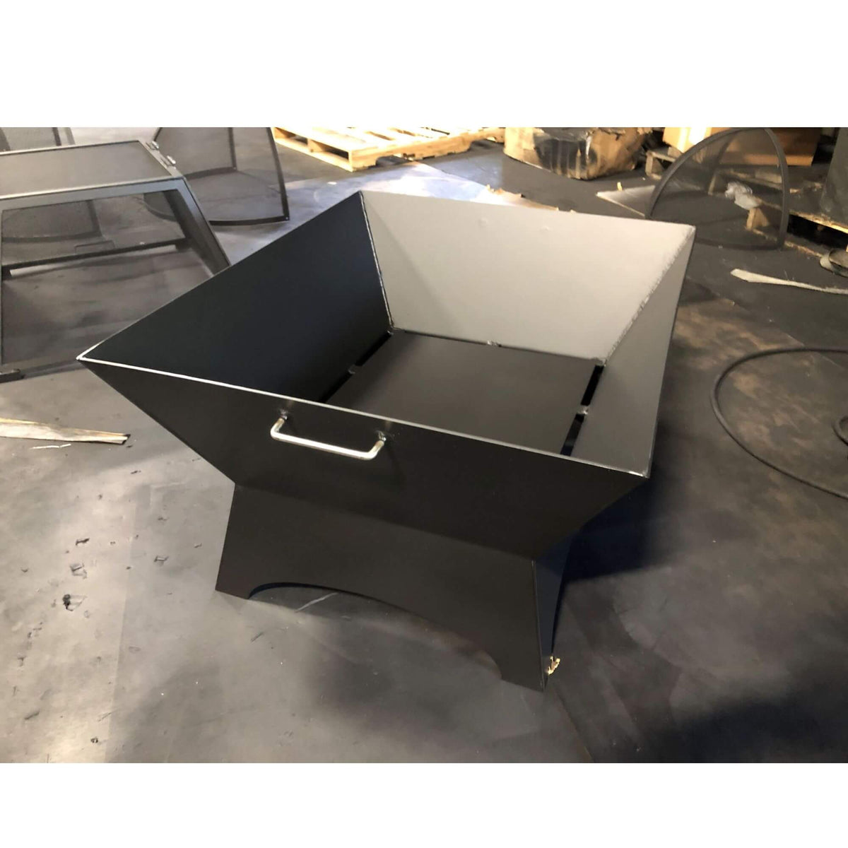 Master Flame square welded steel fire pit, front view with handle